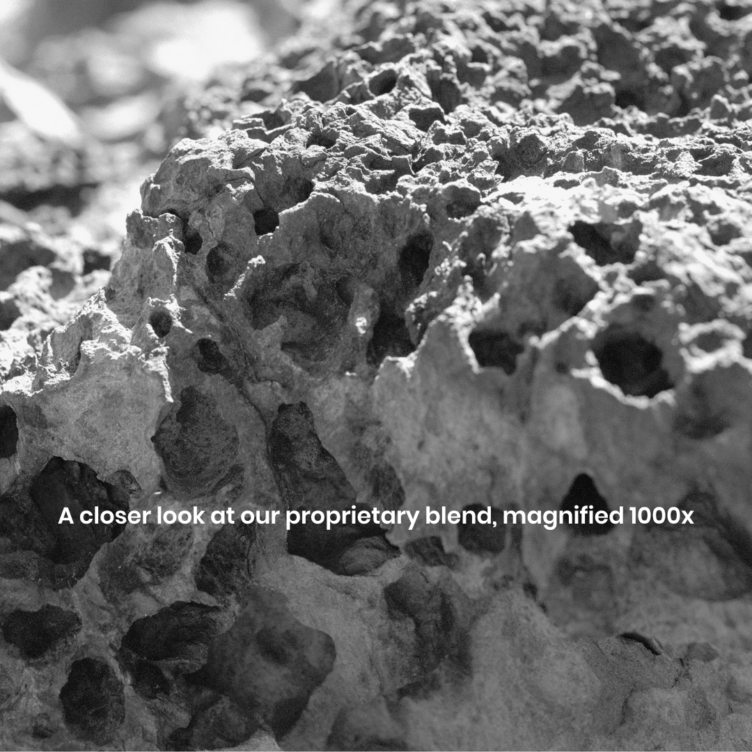 A 1000x magnified image of our patented blend on coconut charcoal and bentonite.